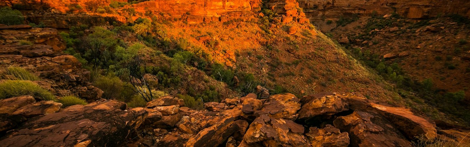 aerial view of rock cliffs under cloudy sky
