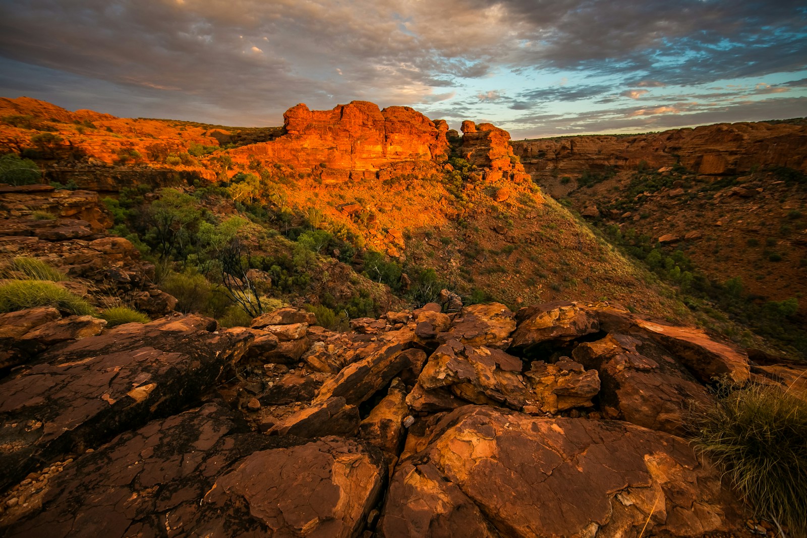 Photo by Philippe Wuyts aerial view of rock cliffs under cloudy sky