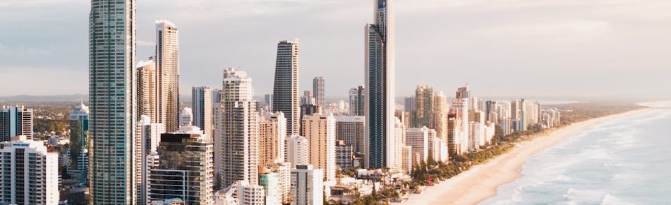 high rise buildings near sea during daytime